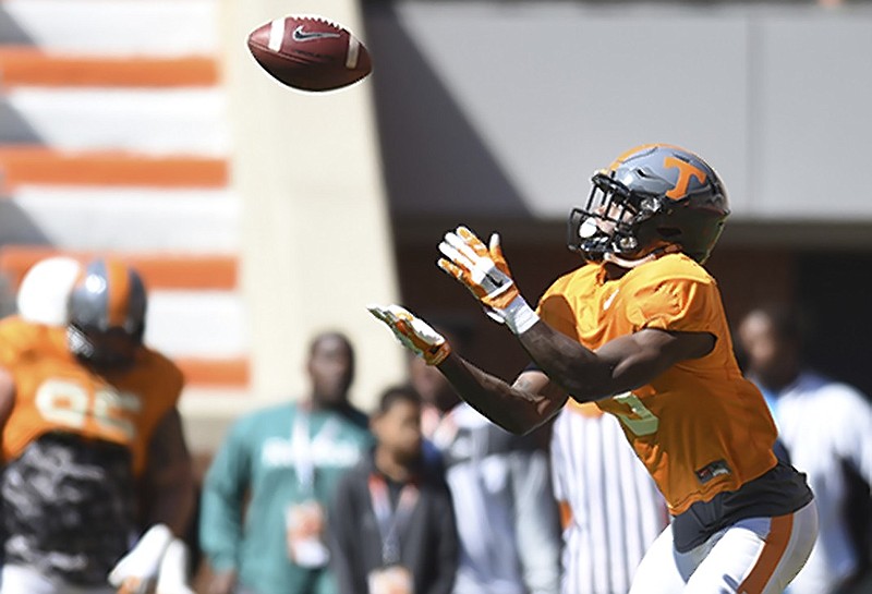 Tennessee defensive back Marquill Osborne (3) catches the ball during spring football practice at Neyland Stadium on Saturday, April 9, 2016 in Knoxville, Tenn. (Adam Lau/Knoxville News Sentinel via AP) MANDATORY CREDIT