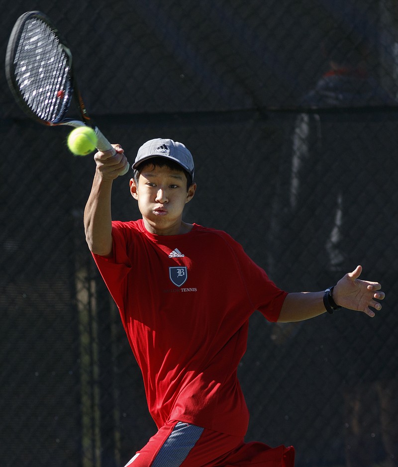 Baylor tennis player Brandon Kali returns the ball in his boys A-4 singles final match against St. Xavier's Spencer Blandford at the Rotary tennis tournament at Baylor School on Saturday, April 9, 2016, in Chattanooga, Tenn.