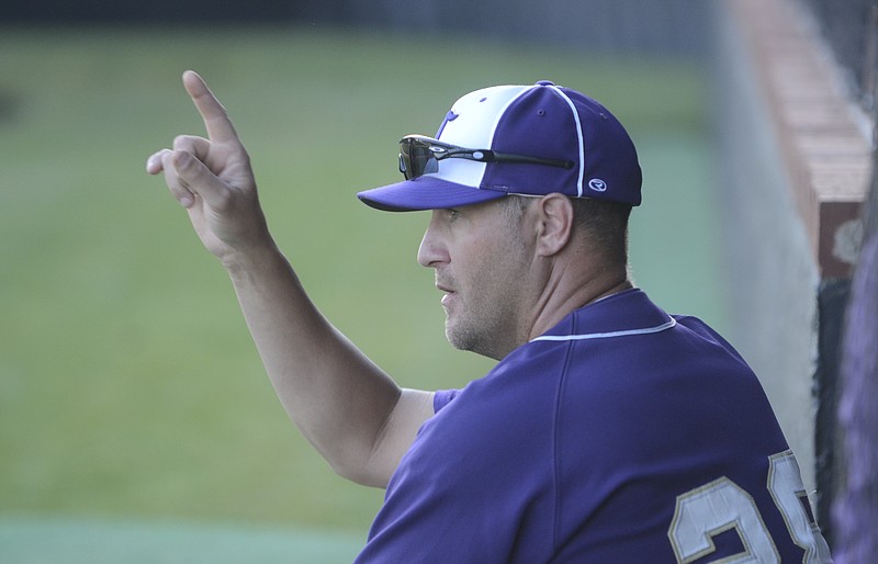 Central coach Glen Carter signals during the game against Hixson Wednesday at Hixson High School.
