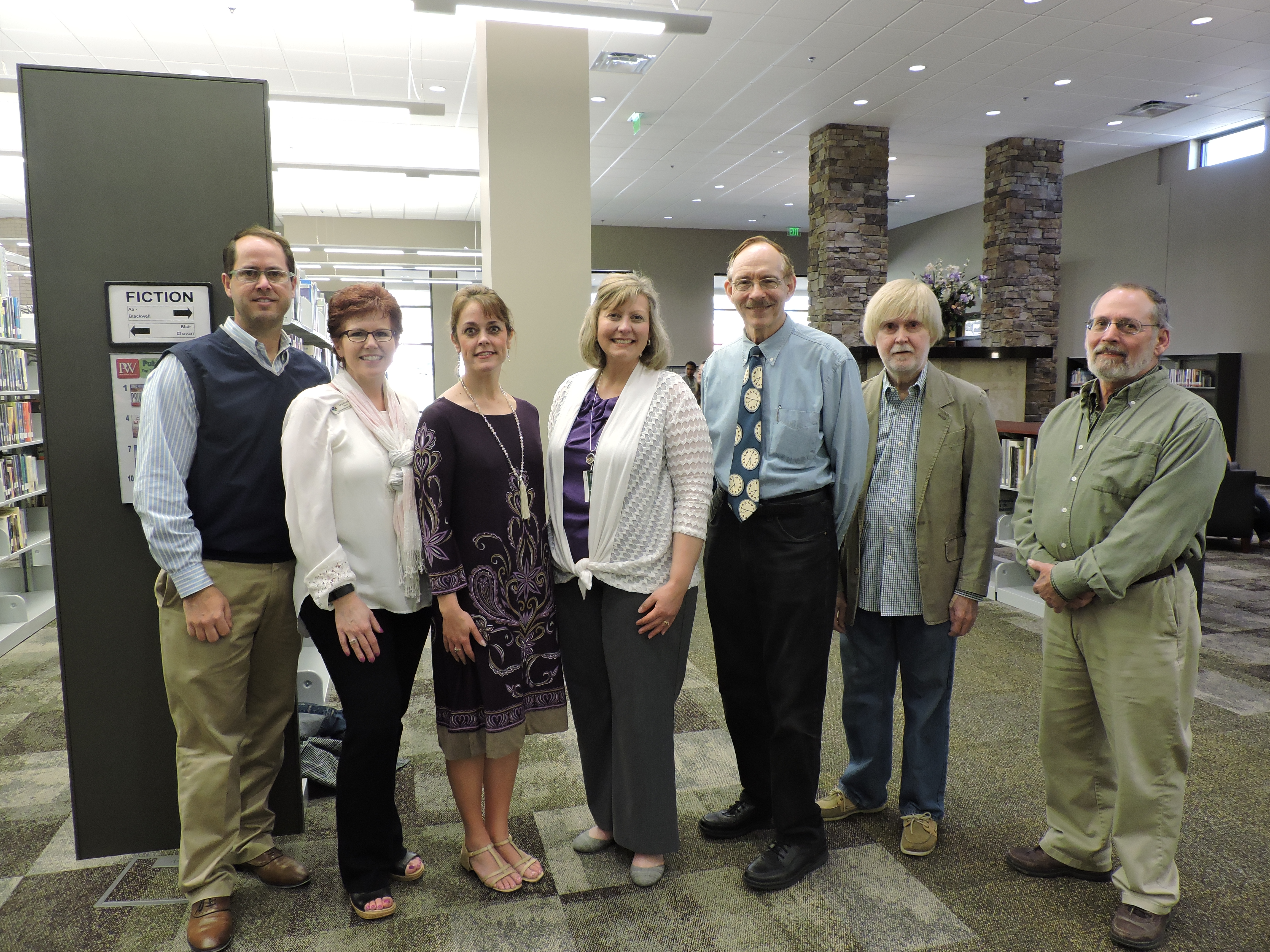Local officials attend the unveiling of the new Children's Department awning at the LaFayette-Walker County Library. From left are architect Kenny McDade, LaFayette-Walker County Library Director Lecia Eubanks, Walker County Schools Director of Curriculum Robin Samples, Walker County Schools Preschool Coordinator Debbie Ingle, Walker County Historical Society President David Boyle, architect David Cameron and architect Jack Killian.