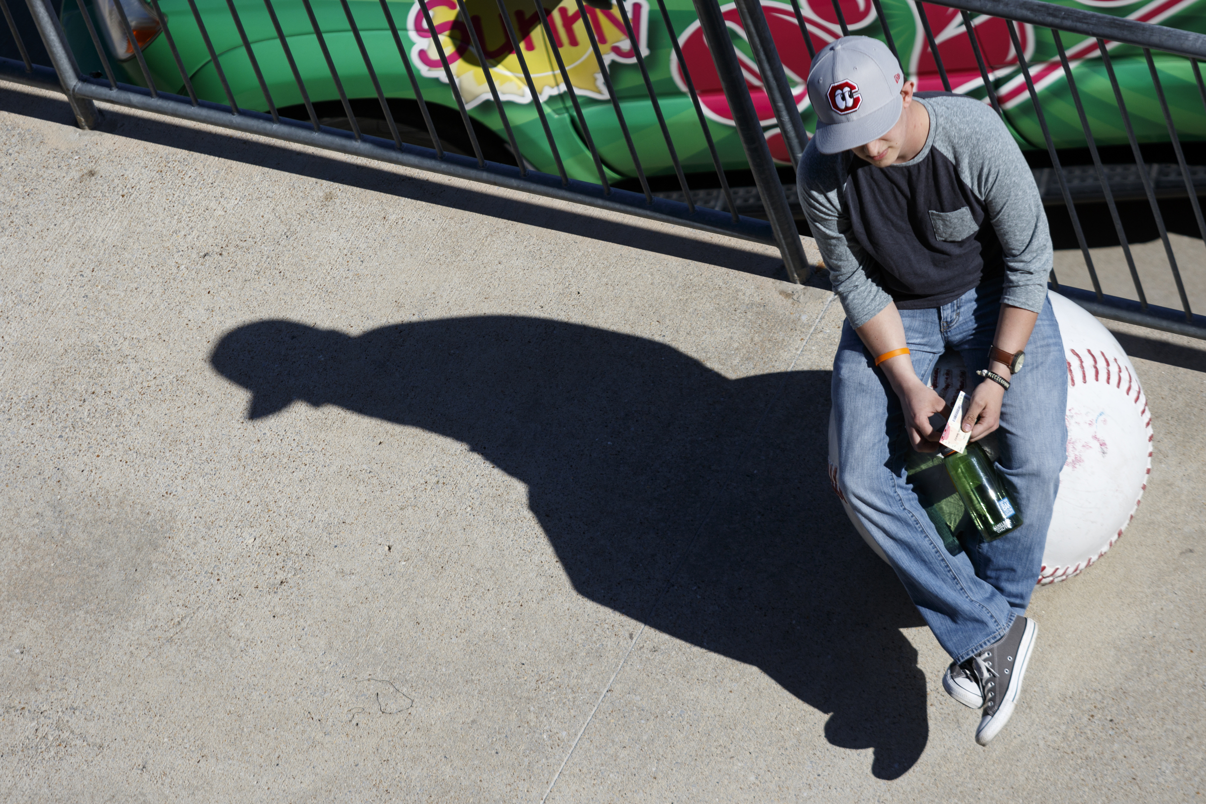 A fan waits for the gates to open for the Lookouts' home opener against the Generals at AT&T Field on Tuesday, April 12, 2016, in Chattanooga, Tenn.