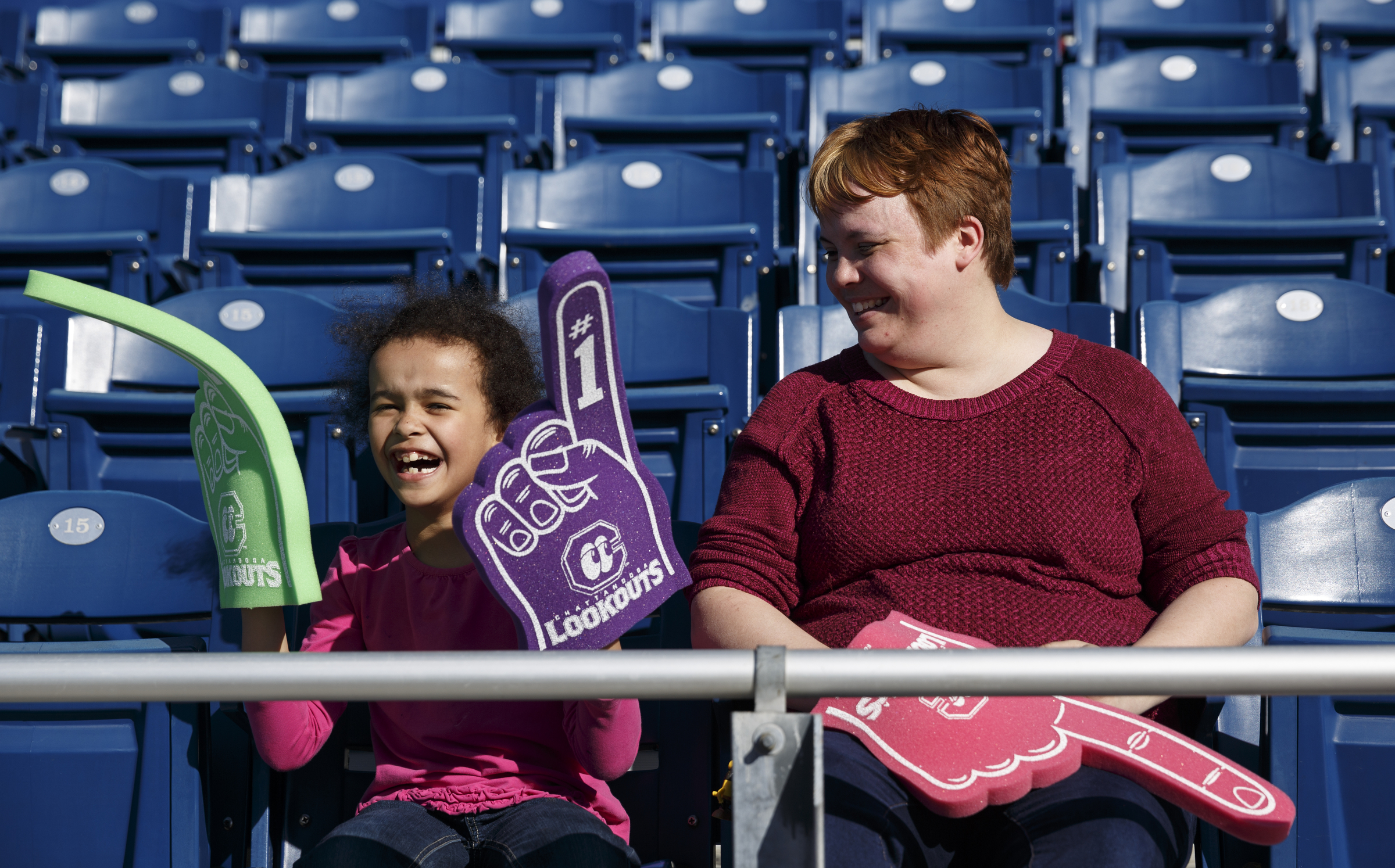 Ashley Eason, left, and Bonnie Eason wait for the start of the Lookouts' home opener against the Generals at AT&T Field on Tuesday, April 12, 2016, in Chattanooga, Tenn.