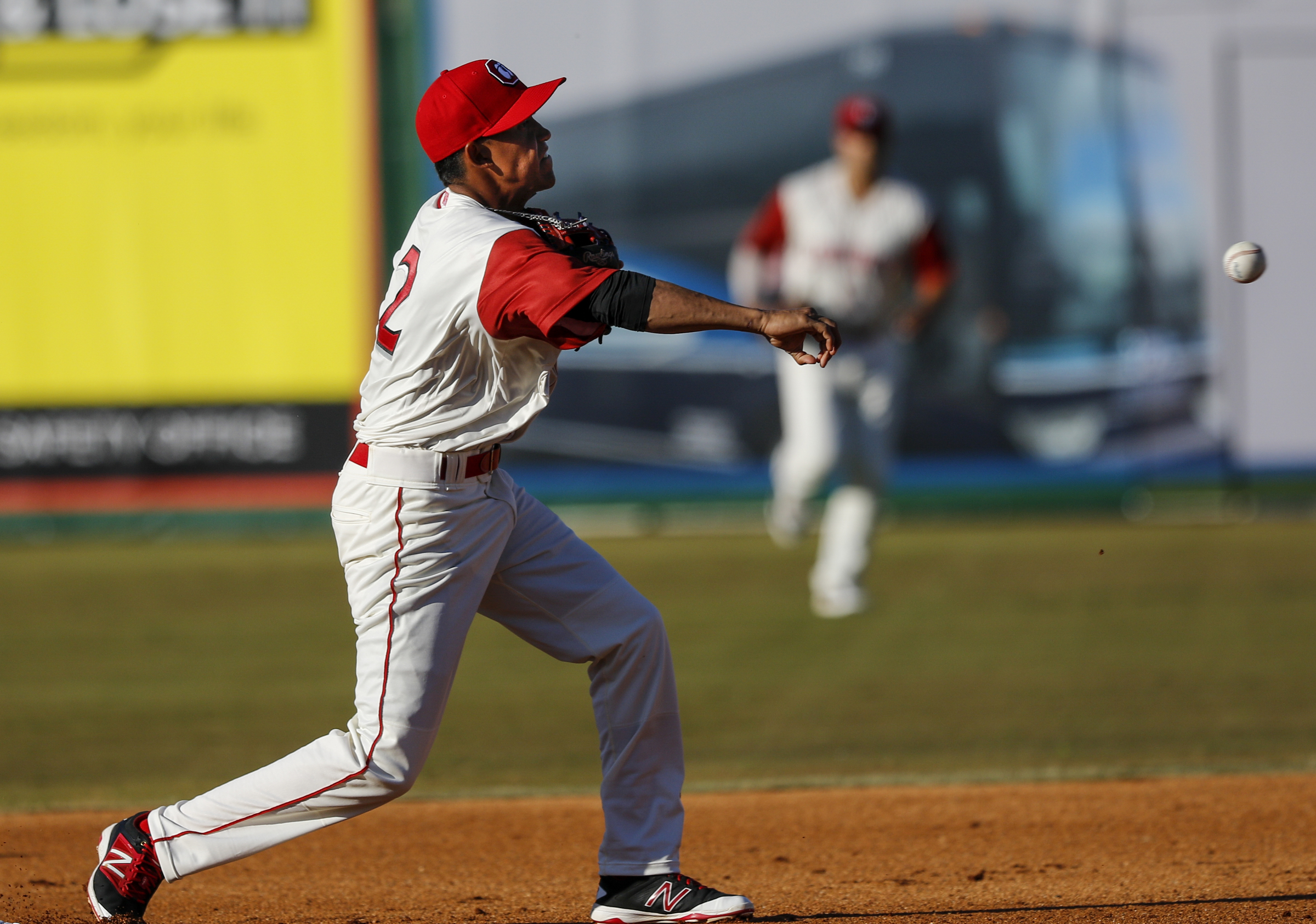 Lookouts shortstop Engelb Vielma makes the throw to first for a double play during the Lookouts' home opener against the Generals at AT&T Field on Tuesday, April 12, 2016, in Chattanooga, Tenn.
