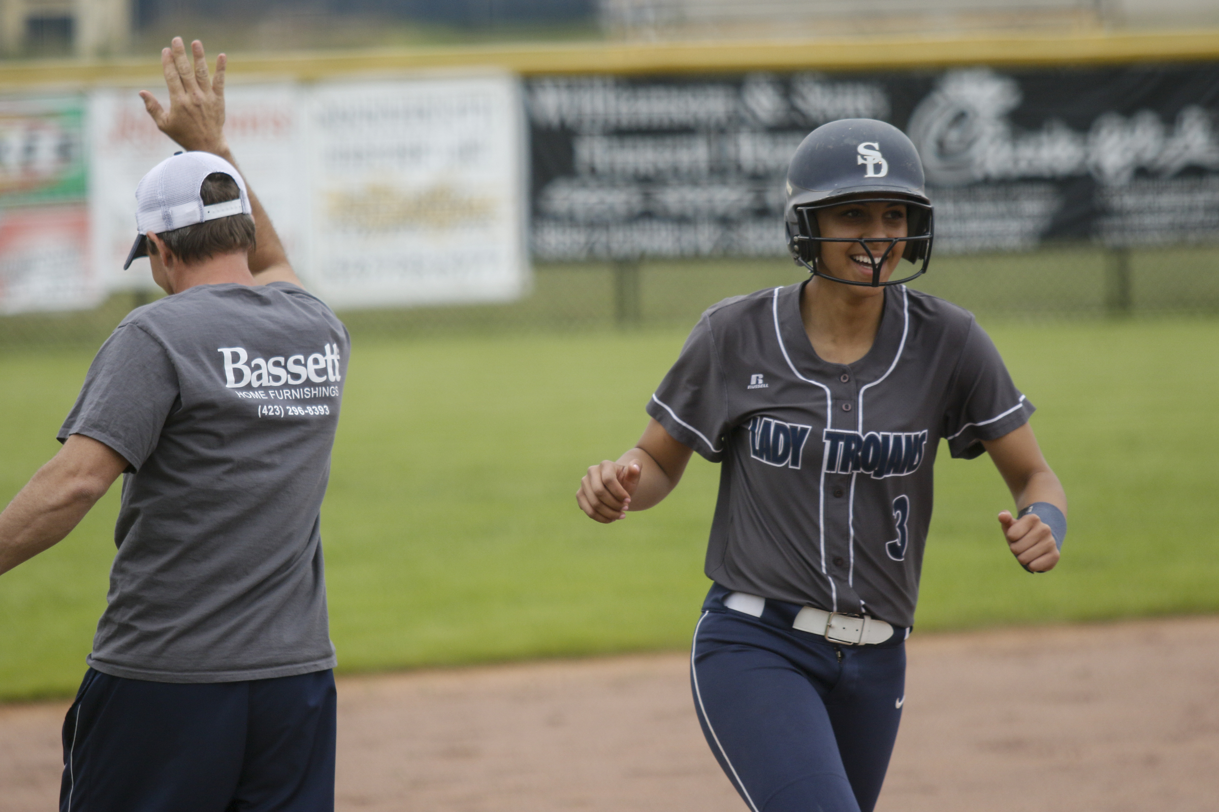 Soddy-Daisy runner Alexis Trimiar rounds 3rd after a homer during their softball game against Ooltewah at Soddy-Daisy High School on Wednesday, April 13, 2016, in Soddy-Daisy, Tenn.