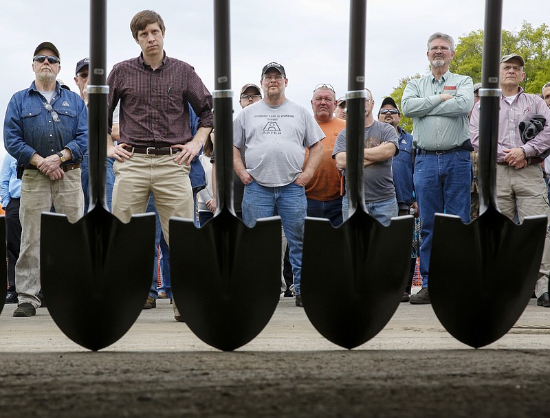 Shovels are displayed as workers listen to Astec President Malcolm Swanson speak at a groundbreaking ceremony for a new 24,780-square-foot expansion at Astec Industries on Wednesday, April 13, 2016, in Chattanooga, Tenn.
