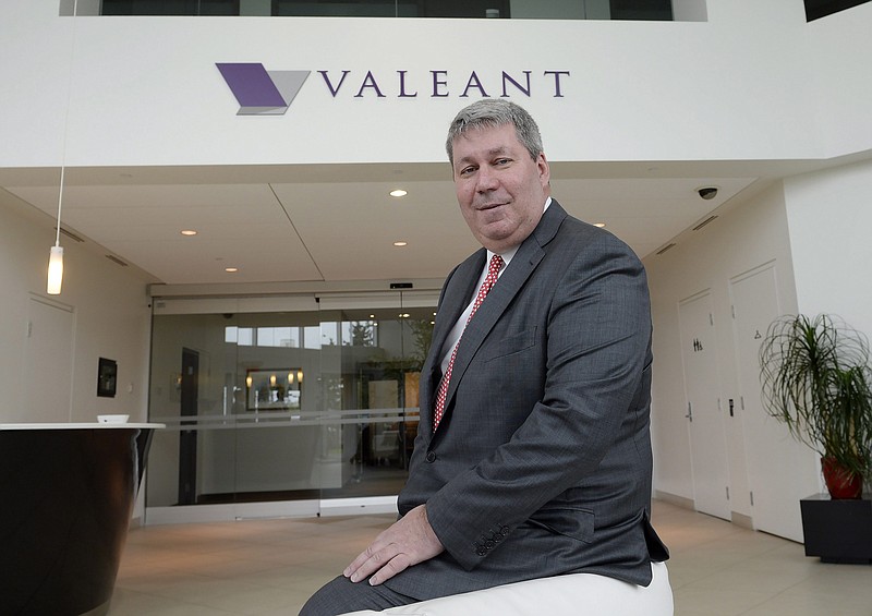 
              FILE - In this May 19, 2015 file photo, Valeant Pharmaceuticals CEO Michael Pearson poses at the company's annual general meeting in Montreal. ON Wednesday, April 13, 2016, Pearson agreed to be deposed by a Senate committee investigating soaring prescription medicine prices. Valeant is one of the companies targeted in the Senate probe of drug prices. (Ryan Remiorz/The Canadian Press via AP, File)   MANDATORY CREDIT
            