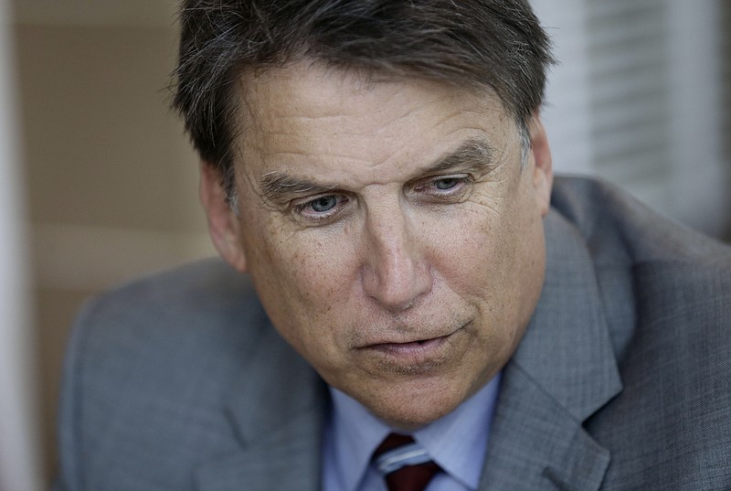 
              North Carolina Gov. Pat McCrory makes remarks during an interview at the Governor's mansion in Raleigh, N.C., Tuesday, April 12, 2016. McCrory says he wants to change a new state law that prevents people from suing over discrimination in state court, but he's not challenging a measure regarding bathroom access for transgender people. (AP Photo/Gerry Broome)
            