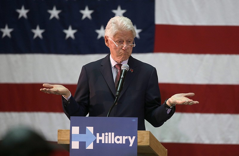 Former President Bill Clinton gestures while speaking in support of his wife, Democratic presidential candidate Hillary Clinton, on Thursday at the Community College of Rhode Island in Warwick, R.I.