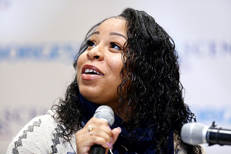 
              Tiana Carruthers, one of the Kalamazoo mass shooting survivors, gives a personal statement at Borgess Medical Center in Kalamazoo, Mich., on Thursday, April 14, 2016. The press conference was the first time Carruthers has made a public appearance since she was shot four times by alleged gunman Jason Dalton on Feb. 20, 2016. (Chelsea Purgahn/Kalamazoo Gazette-MLive Media Group via AP) LOCAL TELEVISION OUT; LOCAL RADIO OUT; MANDATORY CREDIT
            
