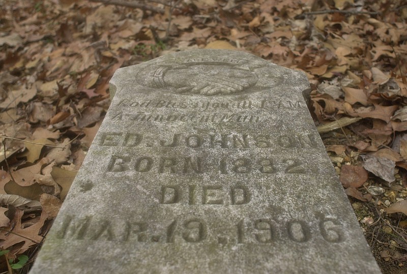 The tombstone of Ed Johnson, an African-American lynched from the Walnut Street Bridge in 1906 lies in Pleasant Garden Cemetery atop Missionary Ridge.