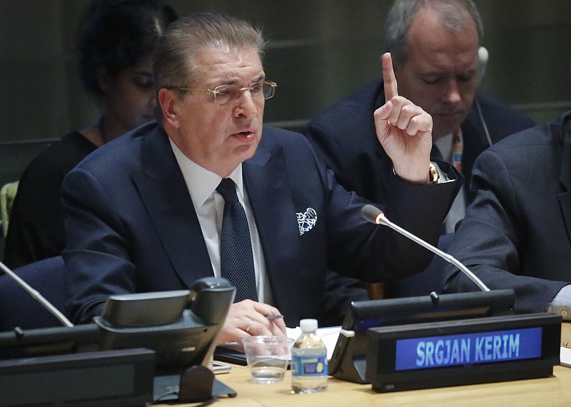 
              Former Macedonian Foreign Minister Srgjan Kerim gestures as he address U.N. General Assembly members about his candidacy for U.N. Secretary General, Thursday April 14, 2016 at U.N. headquarters. The United Nations is taking a historic step to open up the usually secret process of selecting the next secretary-general, giving all countries the chance to question candidates on issues. (AP Photo/Bebeto Matthews)
            