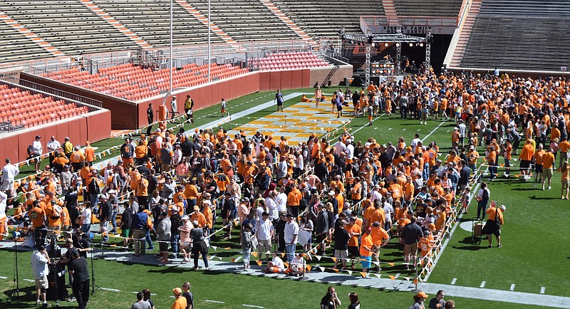 Fans line up for autograph during Fan Day before the Orange and White game.  The University of Tennessee Orange/White Spring Football Game was held at Neyland Stadium in Knoxville on April 16, 2016.
