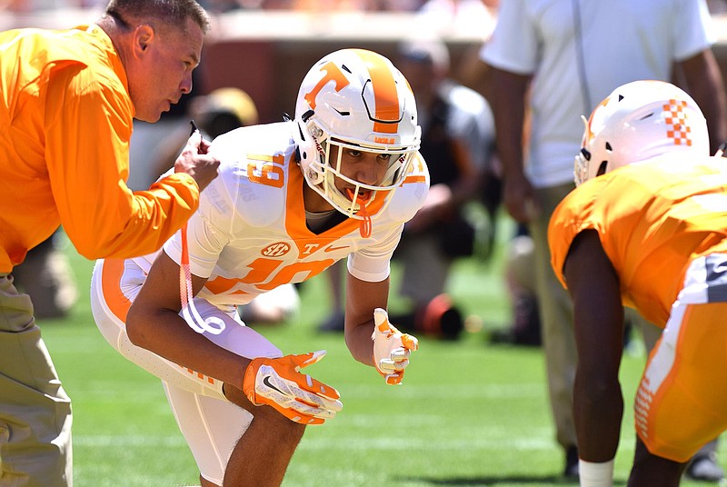 Head coach Butch Jones prepares the blow his whistle to start the blocking drill between Jeff George (19) and Marquill Osborne (3).  The University of Tennessee Orange/White Spring Football Game was held at Neyland Stadium in Knoxville on April 16, 2016.