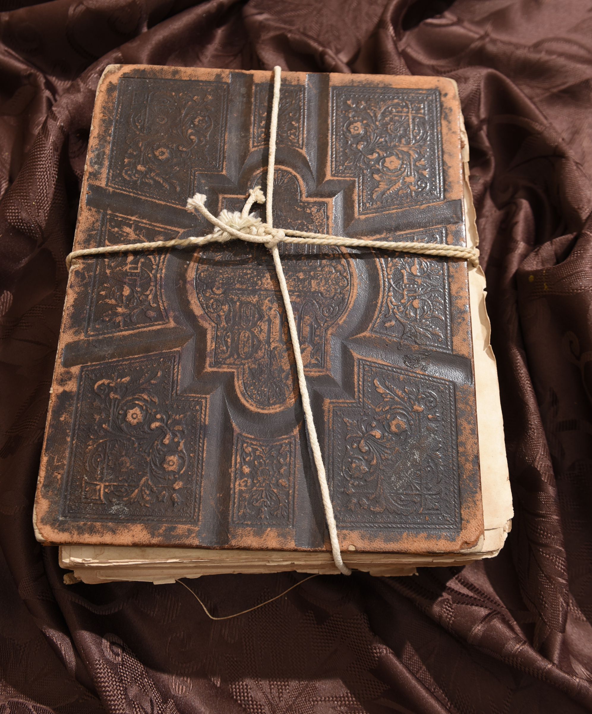 Photographed on Tuesday, Nov. 3, 2015, in Cleveland, Tenn., this circa 1885 family Bible originally owned by Tim Burdashaw's great grandparents, Lillian and William S. Burdashaw, is held together by a cord.