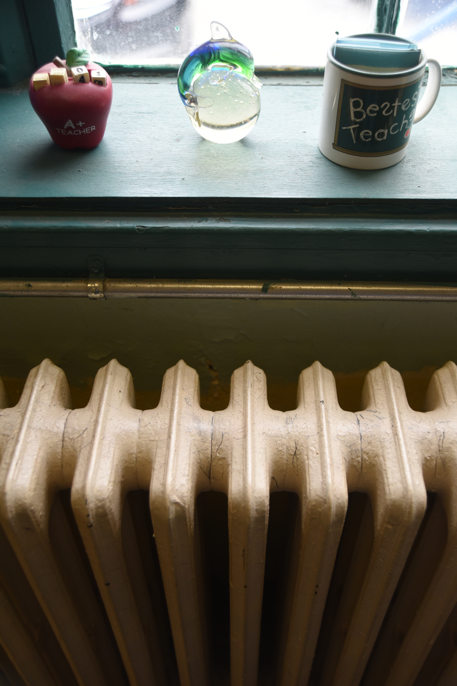 A radiator is lit by window light Wednesday, April 13, 2016 at Falling Water Elementary School.