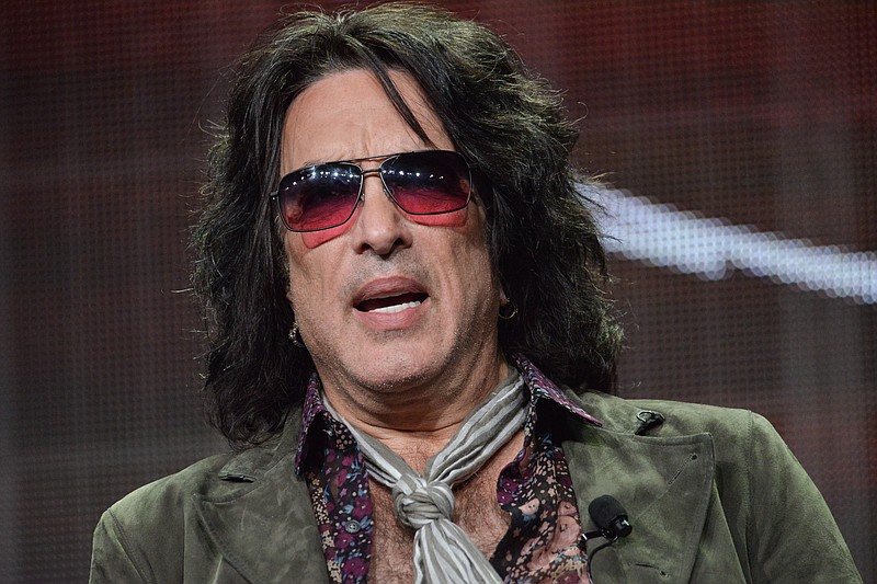 
              FILE - In this July 11, 2014 file photo, Paul Stanley speaks onstage during the "4th and Loud" portion of the AMC 2014 Summer TCA in Beverly Hills, Calif. Shoulder surgery has prevented Stanley from performing an intimate show with KISS. Gene Simmons, Ace Frehley and Peter Criss donned their classic stage makeup and costumes to play a four-song set Friday, April 15, 2016, to benefit multiple sclerosis research. (Photo by Richard Shotwell/Invision/AP, File)
            