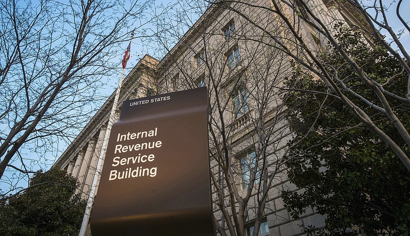 FILE - This April 13, 2014, file photo shows the Internal Revenue Service (IRS) headquarters building in Washington. Millions of taxpayers face a midnight deadline Monday, March 18, 2016, to file their tax returns, while millions of other Americans seek more time, a six-month extension. The filing deadline was delayed three days beyond the traditional April 15 deadline, because Friday was a legal holiday in the District of Columbia. (AP Photo/J. David Ake, File)