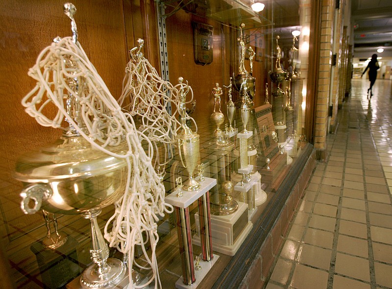 Sports trophies are displayed in one of many glass cases at Little Rock Central High School in Little Rock, Ark..