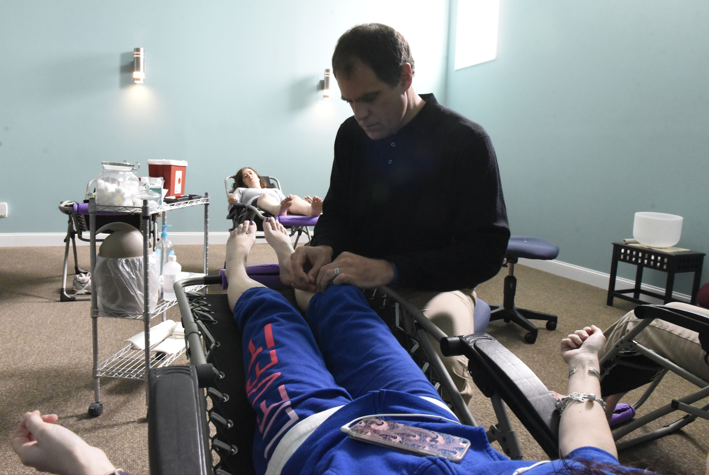 Acupuncturist Chad Dupuis works with Amanda Cambron at the Yin Yang House on Wednesday, Apr. 6, 2016, in Chattanooga, Tenn. Acupuncture can be used as a treatment for allergies and sinus congestion.