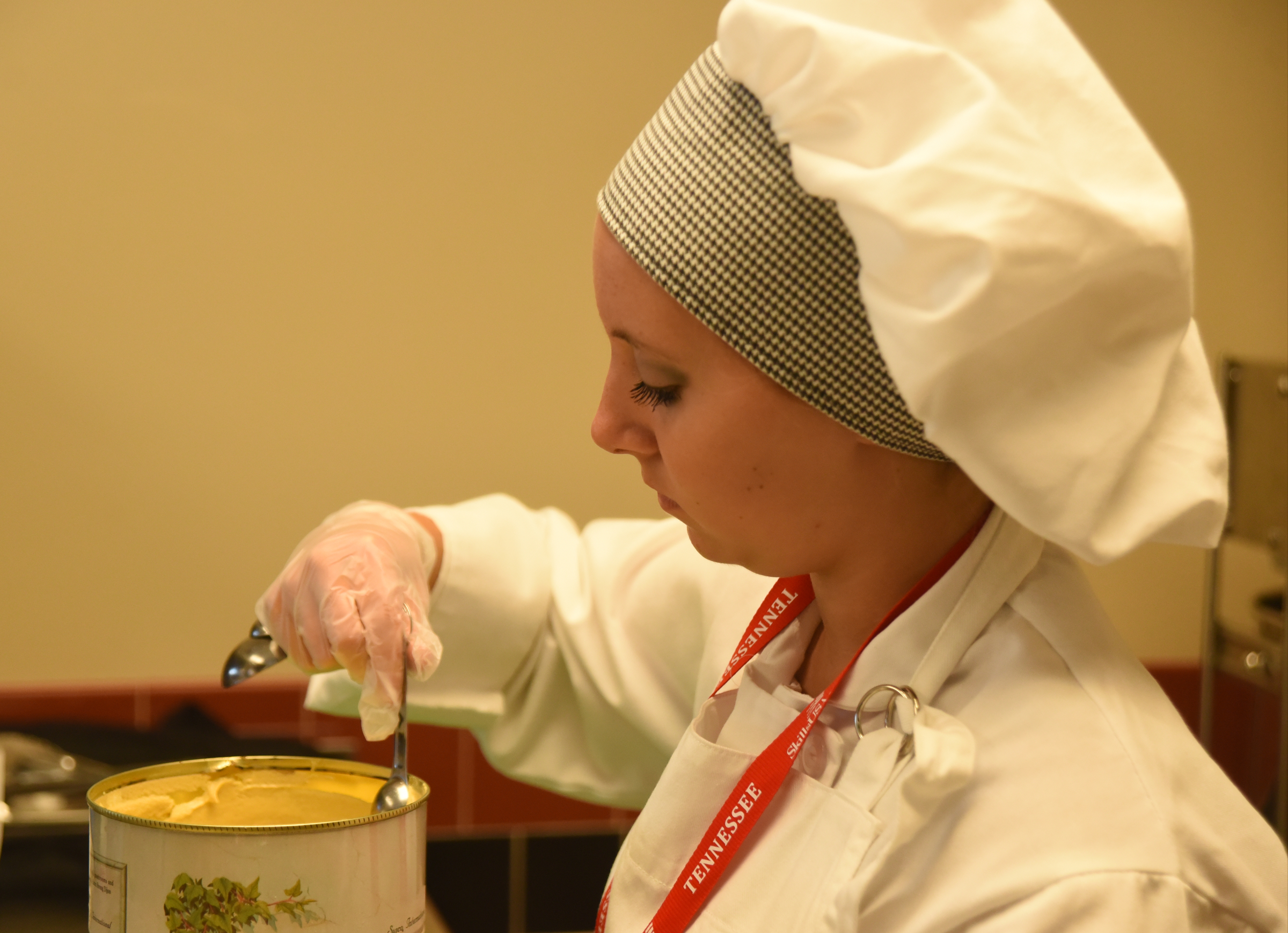 Heidi Shanks, from Cherokee High School, measures ingredients for a dressing Monday, April 18, 2016 during the SkillsUSA State Culinary Competition at Virginia College.