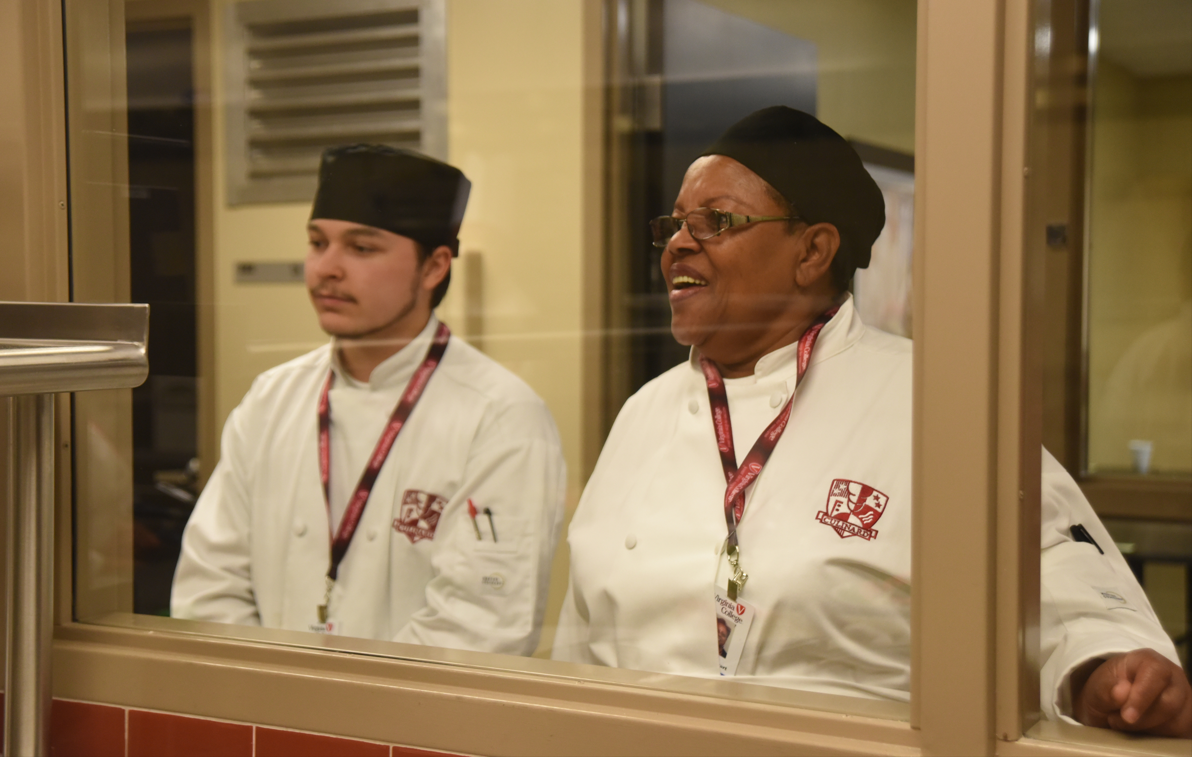 Culinary students Ruth Stewart, right, and Tyler Cordwell watch the competition Monday, April 18, 2016 during the SkillsUSA State Culinary Competition at Virginia College.