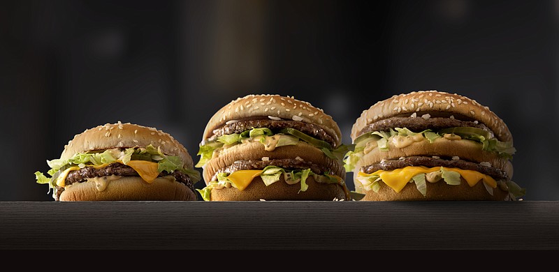 
              This photo provided by McDonald's shows, from left to right: McDonald's Mac Jr., Big Mac and Grand Mac. McDonald's is testing bigger and smaller versions of its Big Mac as the world's biggest hamburger chain pushes to revive its business. The company says it's testing the Grand Mac and Mac Jr. in the Central Ohio and the Dallas areas, and will see how they do before deciding on a national rollout. (McDonald's via AP) MANDATORY CREDIT
            