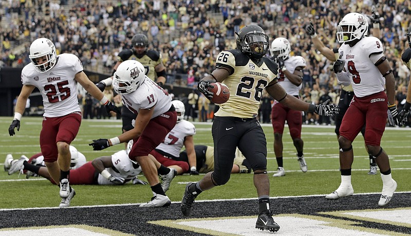 Vanderbilt running back Ralph Webb scored the winning touchdown in a 34-31 win over Massachusetts in 2014. UMass is opening the 2016 season at Floria and will play at Georgia in 2018.