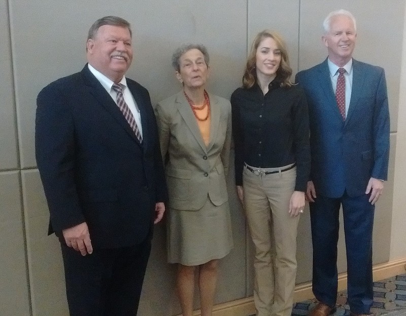Officials line up Wednesday morning at a press conference before the Tennessee Association of Manufacturers luncheon at the Chattanooga Convention Center. From left, Hamilton County Mayor Jim Coppinger, Nancy Hoffman of Jobs for the Future, Annie White of Pathways to Prosperity of Southeast Tennessee and Tim Spires, president and CEO of the Tennessee Association of Manufacturers.