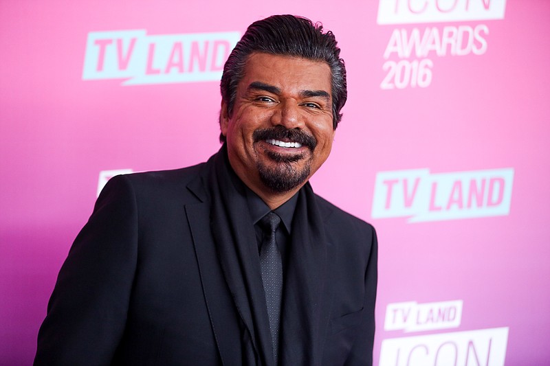 
              FILE - In this April 10, 2016 file photo, George Lopez arrives at the 2016 TV Land Icon Awards in Santa Monica, Calif. Lopez, D.L. Hughley, Cedric the Entertainer, Eddie Griffin and Charlie Murphy will be making a series for the BET Network on the behind-the-scenes world of a comedy tour. "Comedy Get Down" is about their concert tour of the same name. BET described the scripted series as a workplace comedy at its core, and it was one of several new projects announced Wednesday, April 20, at a presentation to advertisers. (Photo by Rich Fury/Invision/AP, File)
            