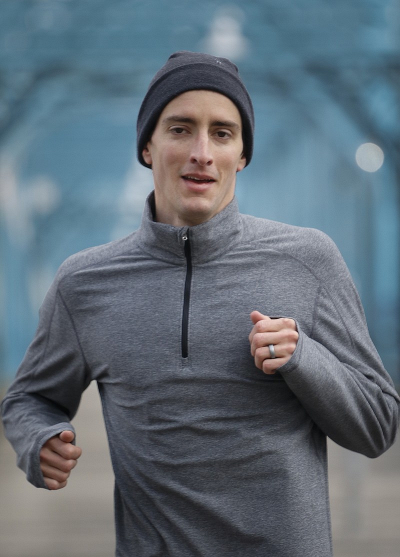 Nathan Sexton, 29, head of the Business Intelligence department for Bellhops, goes on a 5k lunch training run on Feb. 25.