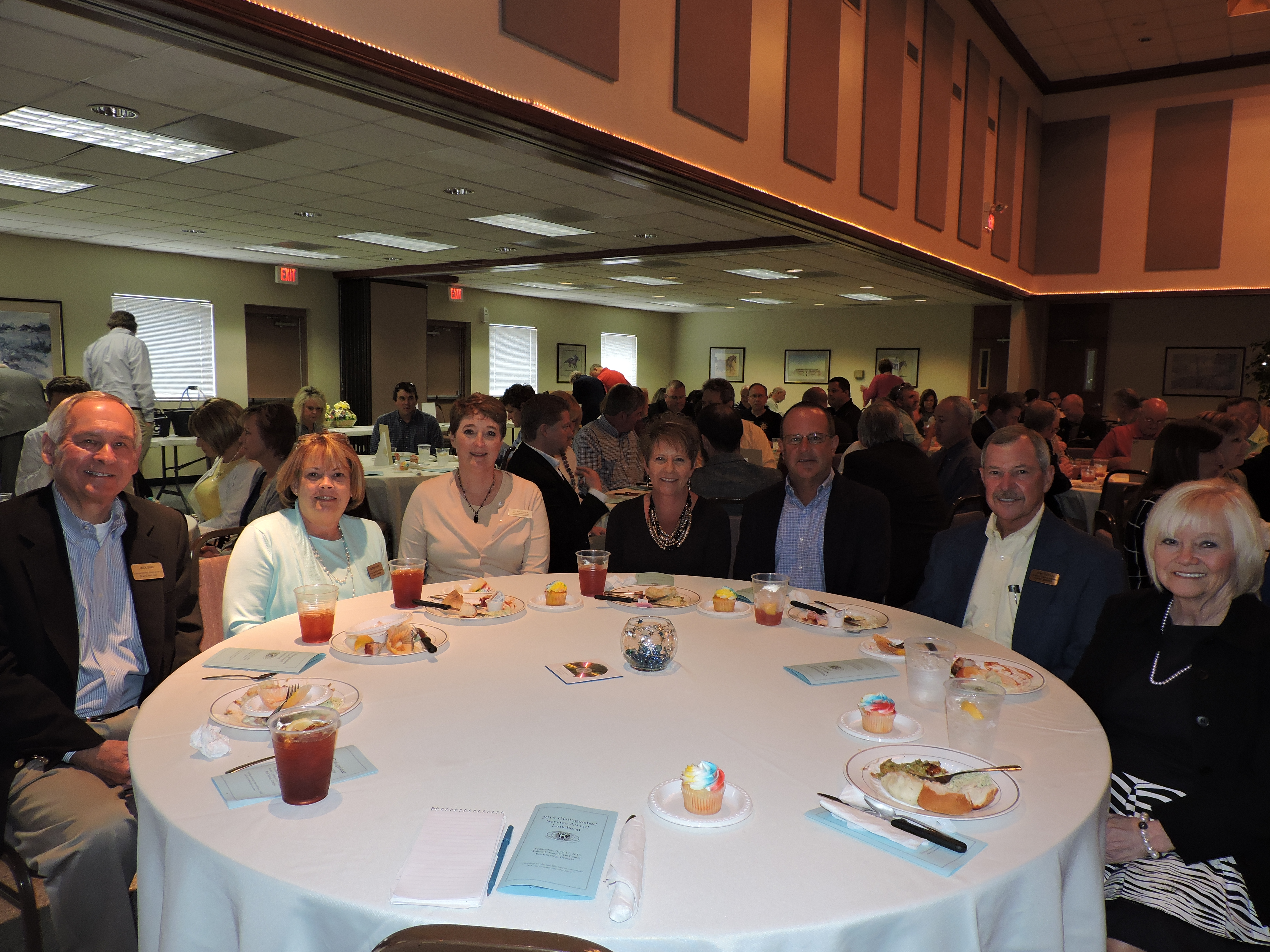 Catoosa County School Board members Jack Sims and Gloria Hunt, Assistant Superintendent Dr. Kim Nichols, Superintendent Denia Reese, Eddie Reese, board Chairman Don Dycus and Performance Learning Center Principal Sharon Vaughn, from left, congratulate Reese on being selected as a Distinguished Service Award recipient by the Kiwanis Club.