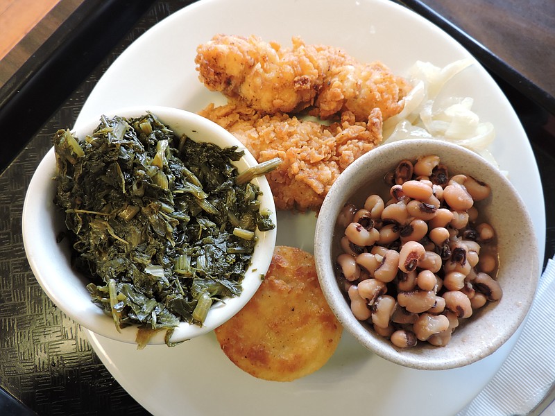 Hillbilly's Restaurant plates consist of a meat and two vegetables. Shown here are fried chicken fingers, onions, black-eyed peas, cornbread and turnip greens.