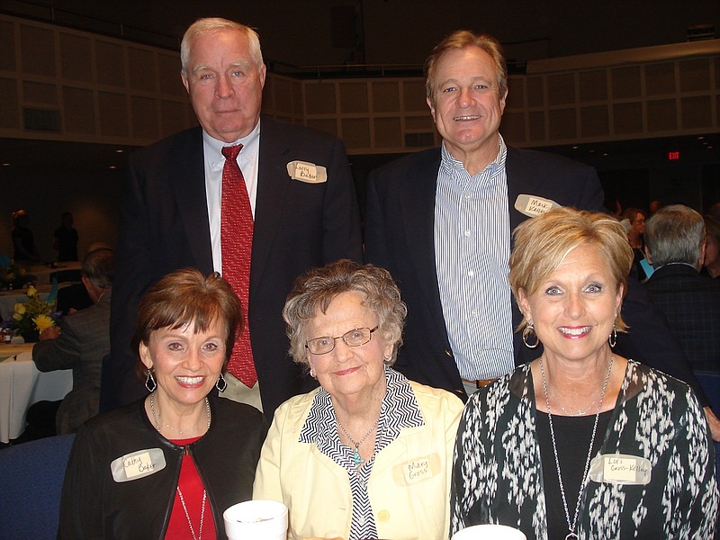 Seated, from left, are Cathy Baker, Mary Gross and Lori Gross-Kelley; standing are Larry Baker, left, and Mark Kelley.