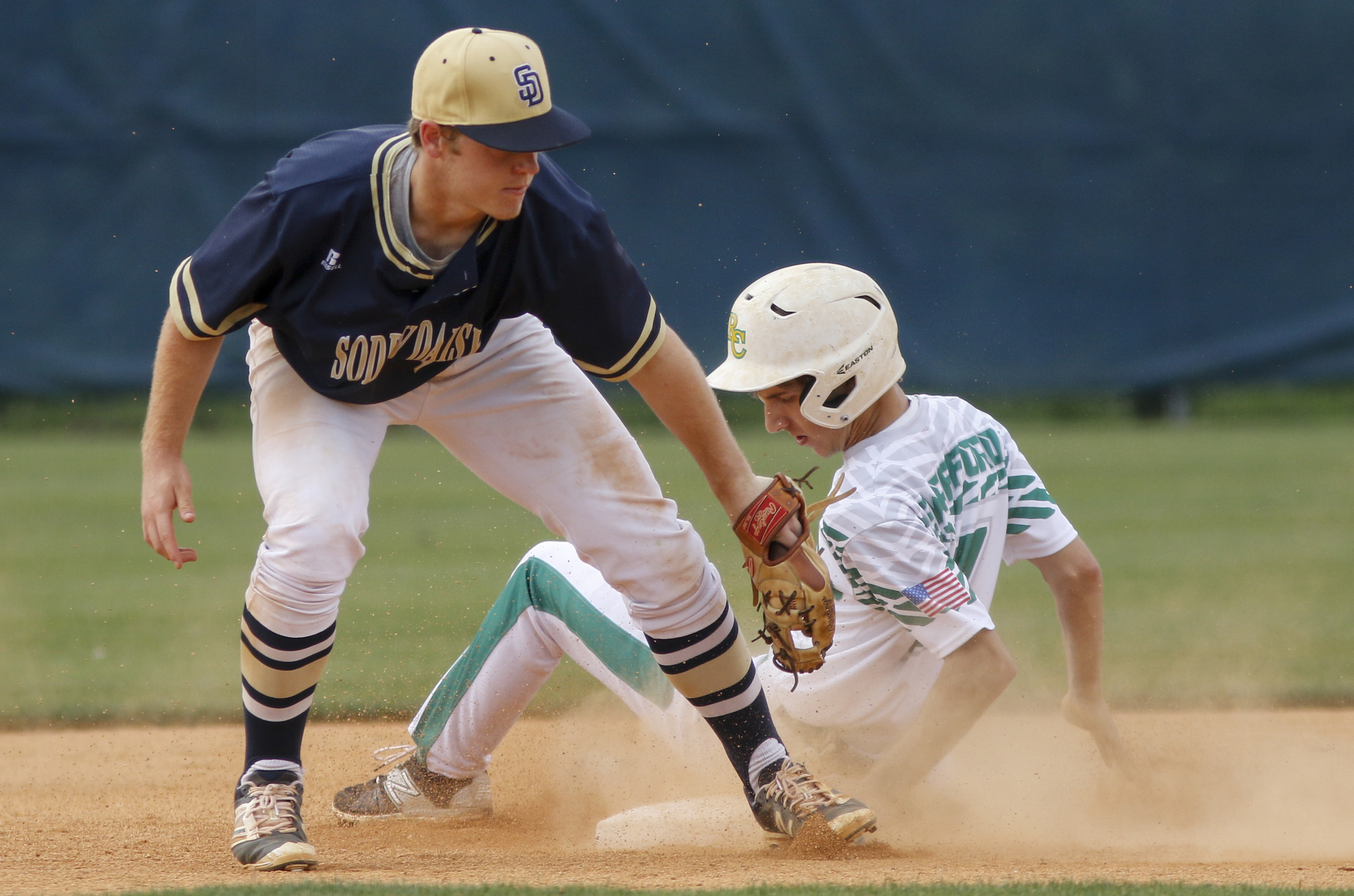 Rhea County runner Garrett Swafford makes it to 2nd beating the tag by Soddy-Daisy 2nd baseman Cale Morgan during their prep baseball game at Soddy-Daisy High School on Thursday, April 21, 2016, in Soddy-Daisy, Tenn.