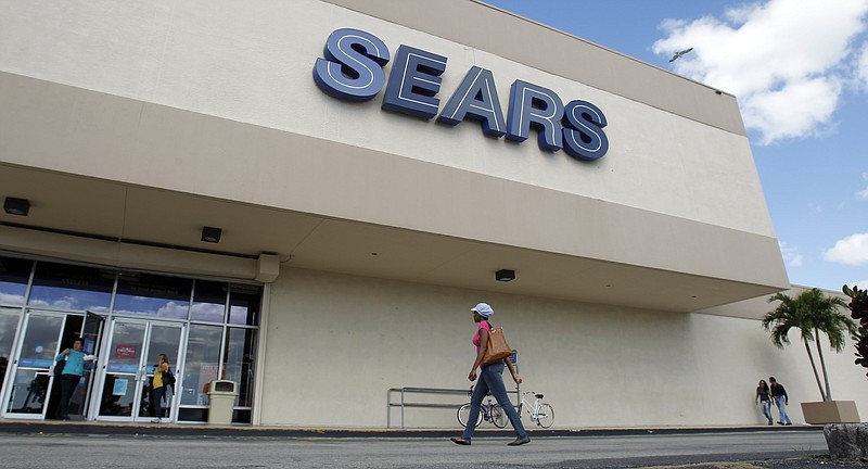 
              FILE- In this Nov. 9, 2012, photo, a Sears store is shown in Hialeah, Fla. Sears Holdings Corp. is announcing Thursday, April 21, 2016, that it will close 68 Kmart stores and 10 Sears stores as it struggles to restore profitability. (AP Photo/Alan Diaz, File)
            