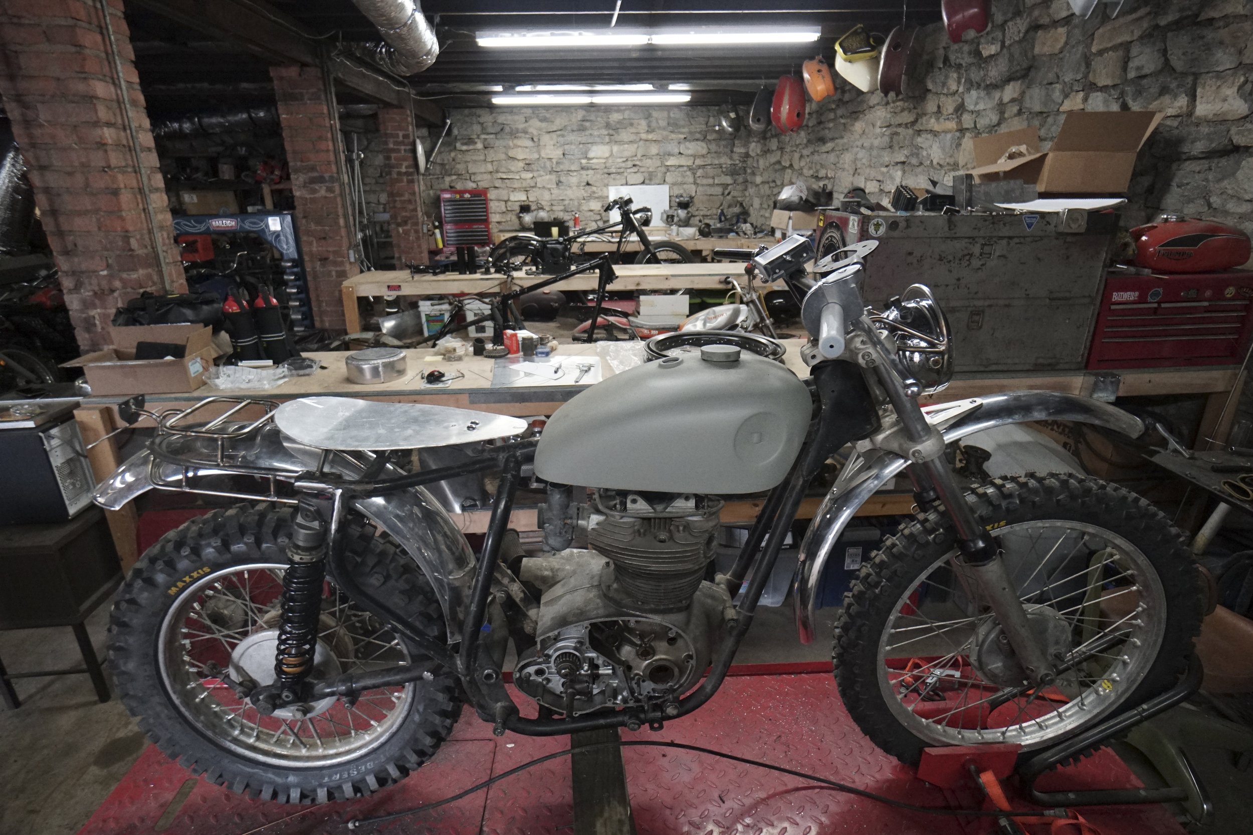 Staff Photo by Dan Henry / The Chattanooga Times Free Press- 3/28/16. Motorcycles being rebuilt are scattered throughout Speed Deluxe's new North Chattanooga location off of Cherokee Boulevard on Monday, March 29, 2016.