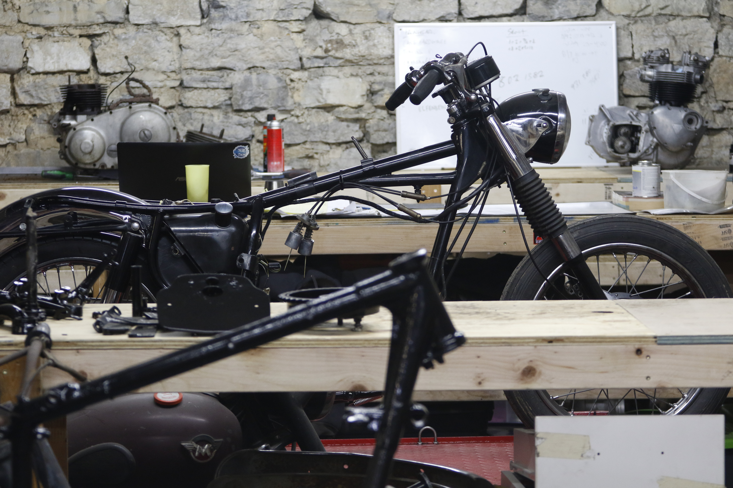 Staff Photo by Dan Henry / The Chattanooga Times Free Press- 3/28/16. Motorcycles being rebuilt are scattered throughout Speed Deluxe's new North Chattanooga location off of Cherokee Boulevard on Monday, March 29, 2016.