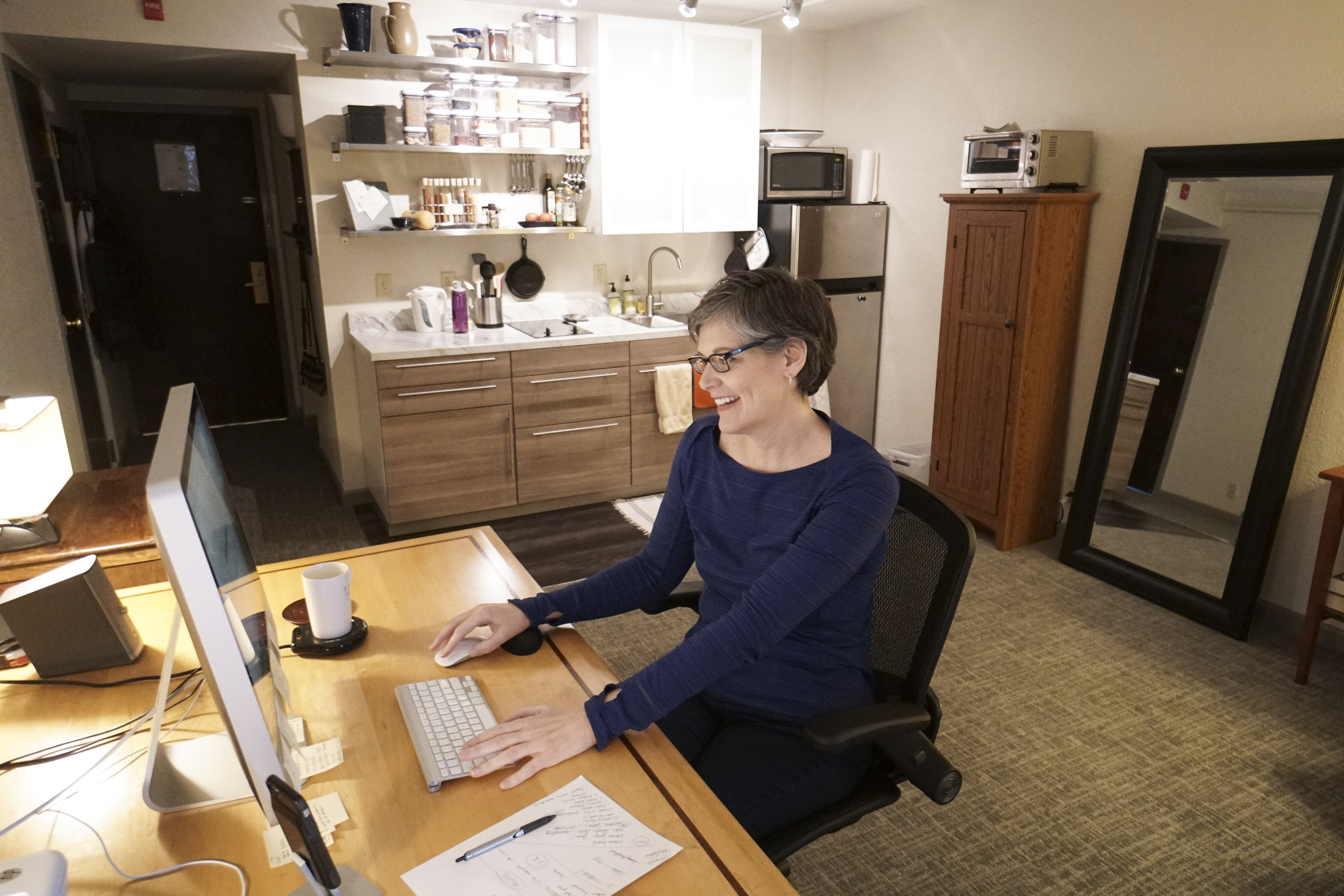 Staff Photo by Dan Henry / The Chattanooga Times Free Press- 4/7/16. Carol Loree works out of her small one-bedroom apartment in Passenger Flats on April 7, 2016.