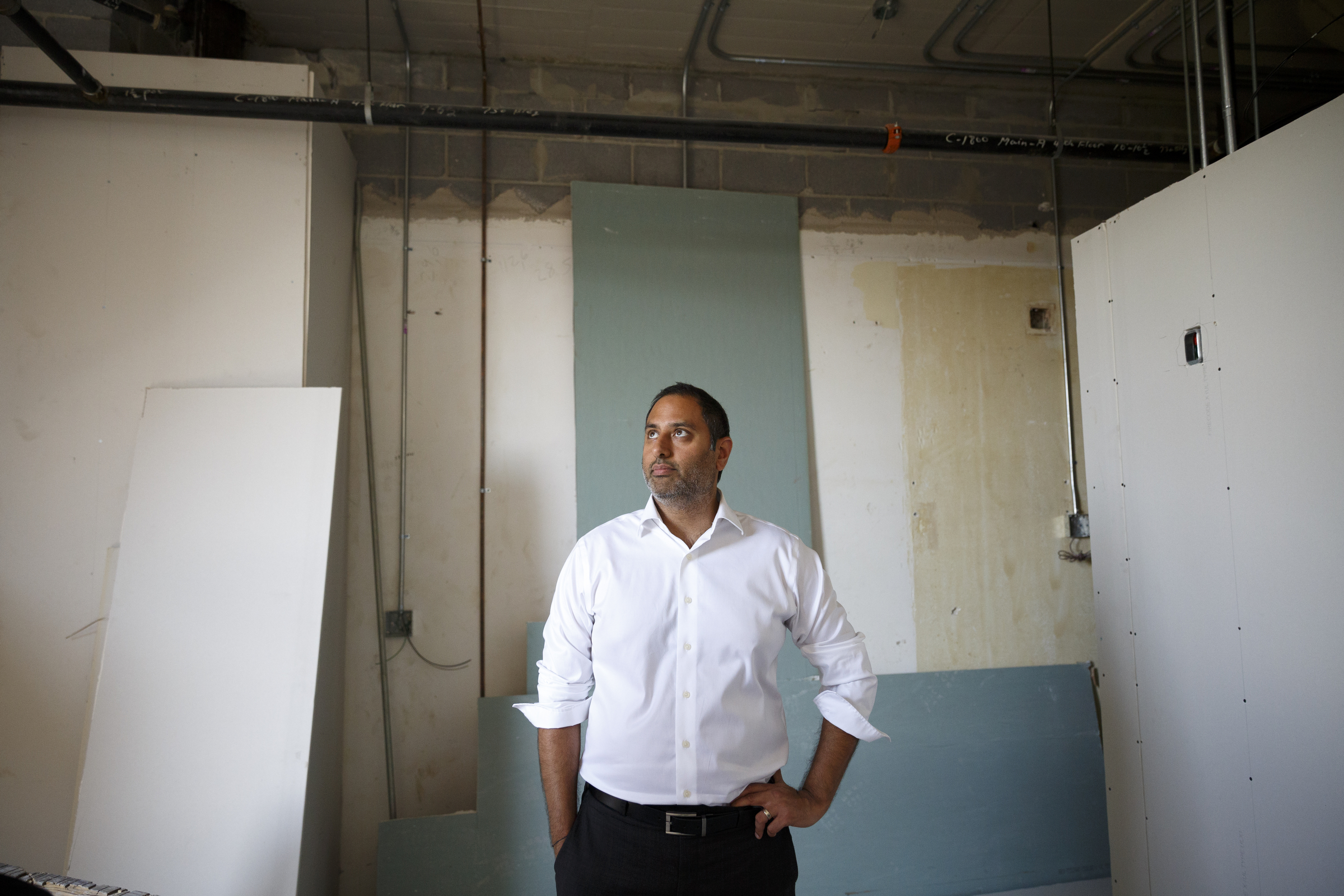 Vic Desai, principal at ViaNova Development, observes ongoing construction at The Clemons building in downtown Chattanooga in September 2015.