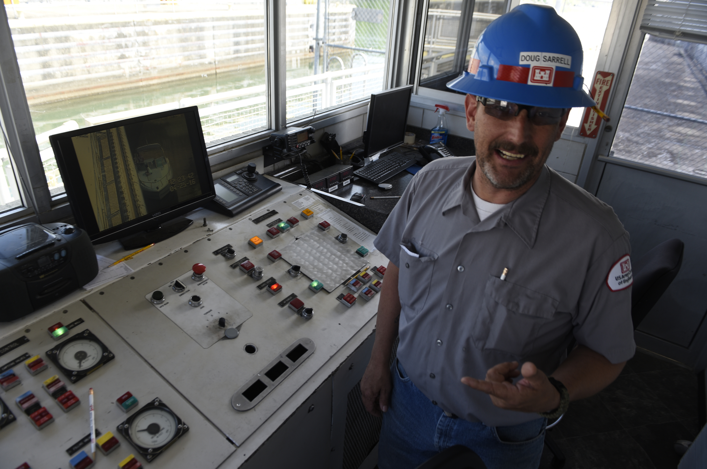 Doug Sarrell of the Corps of Engineers operates the lock at the Chickamauga Dam on Monday, Apr. 25, 2016, in Chattanooga, Tenn.