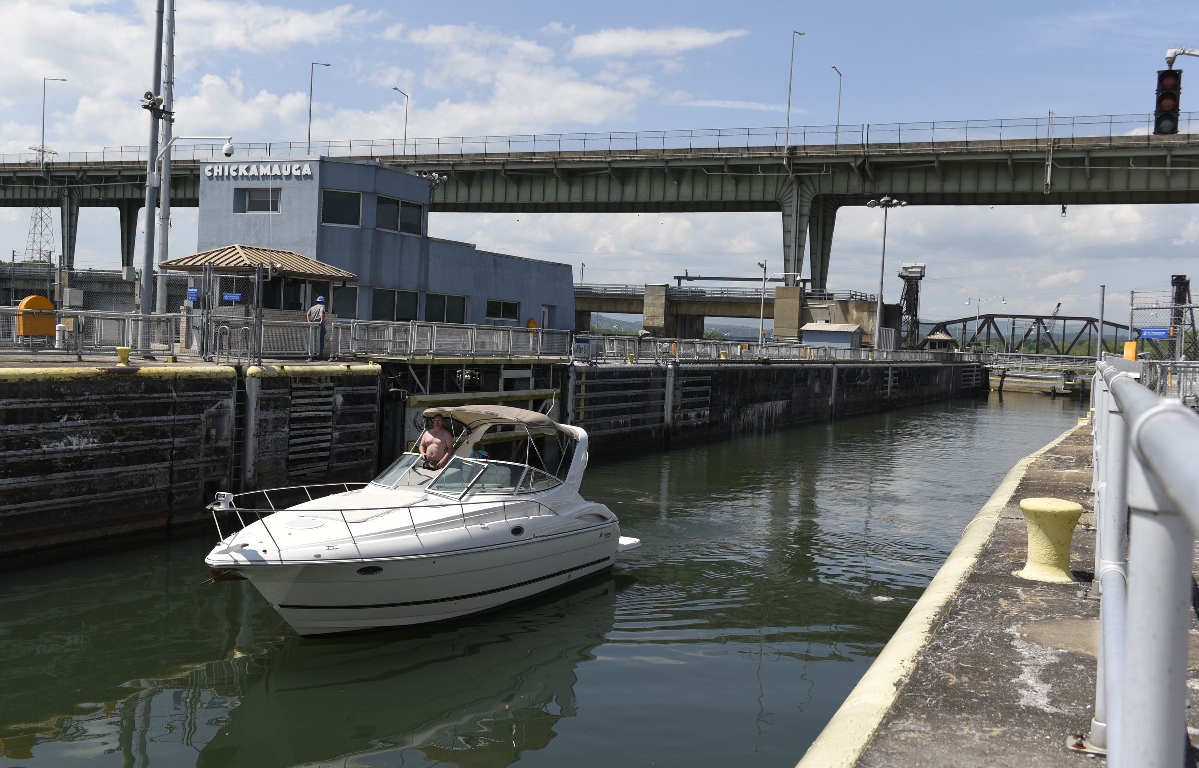Matt and Brittany Cochran, along with their daughter Macy, from Cartersville, Ga., bring their boat through the existing lock at the Chickamauga Dam on Monday, Apr. 25, 2016, in Chattanooga, Tenn.
