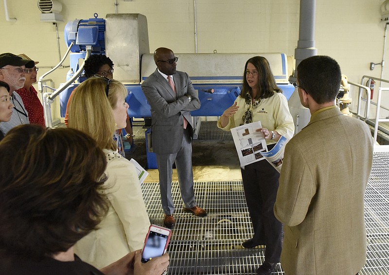 Dorothy Rader. supervisor of water quality and environmental compliance for Tennessee American Water, speaks to guests on a tour of their new $18 million dewatering facility on Monday, Apr. 25, 2016, in Chattanooga, Tenn. 