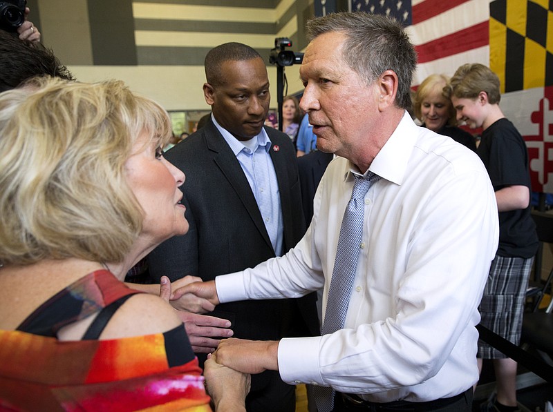 
              Republican presidential candidate, Ohio Gov. John Kasich, shakes hands during a town hall at Thomas farms Community Center Monday, April 25, 2016, in Rockville, Md. (AP Photo/Evan Vucci)
            