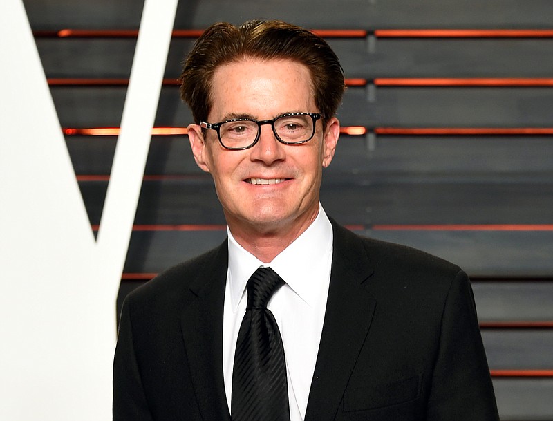 
              FILE - In this Feb. 28, 2016 file photo, actor Kyle MacLachlan arrives at the Vanity Fair Oscar Party in Beverly Hills, Calif. Showtime announced the cast for the reboot of the offbeat series "Twin Peaks," which will star original cast member MacLachlan. The channel released a complete cast list Monday, April 25, includes Naomi Watts, Richard Chamberlain, Jim Belushi, Michael Cera and Amanda Seyfried. (Photo by Evan Agostini/Invision/AP, File)
            