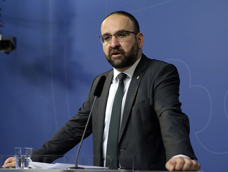 
              FILE - In this April 18, 2016 file photo, Sweden's Housing Minister Mehmet Kaplan appears before the media to confirm his resignation in Stockholm, Sweden. One refused to shake hands with a female journalist. Another compared Israel to Nazi Germany. A third was seen doing hand signs associated with Egypt’s Muslim Brotherhood in the background of a live TV broadcast. The behavior of some Muslim members of Sweden’s Green Party, which is part of a coalition government since 2014, has sparked concerns that the small environmentalist group may have been infiltrated by Islamists.  It also has triggered a wider discussion about whether Sweden has tried so hard to be inclusive and tolerant toward migrants that it's failed to stand up for its own feminist ideals.(Jessica Gow / TT via AP, File) SWEDEN OUT
            
