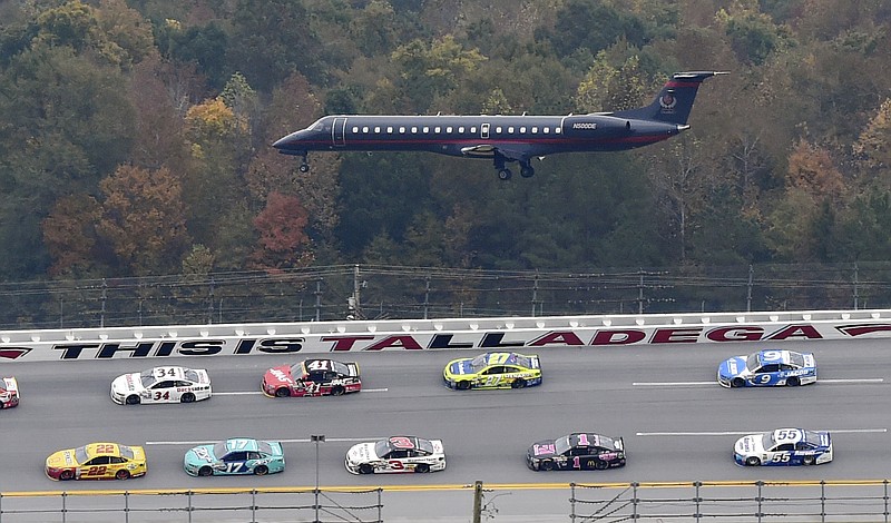 A jet lands at a nearby airport during last October's NASCAR Sprint Cup Series race at the Talladega Superspeedway. The spring Sprint Cup race at Talladega is this Sunday, with Dale Earnhardt Jr. the defending champion.