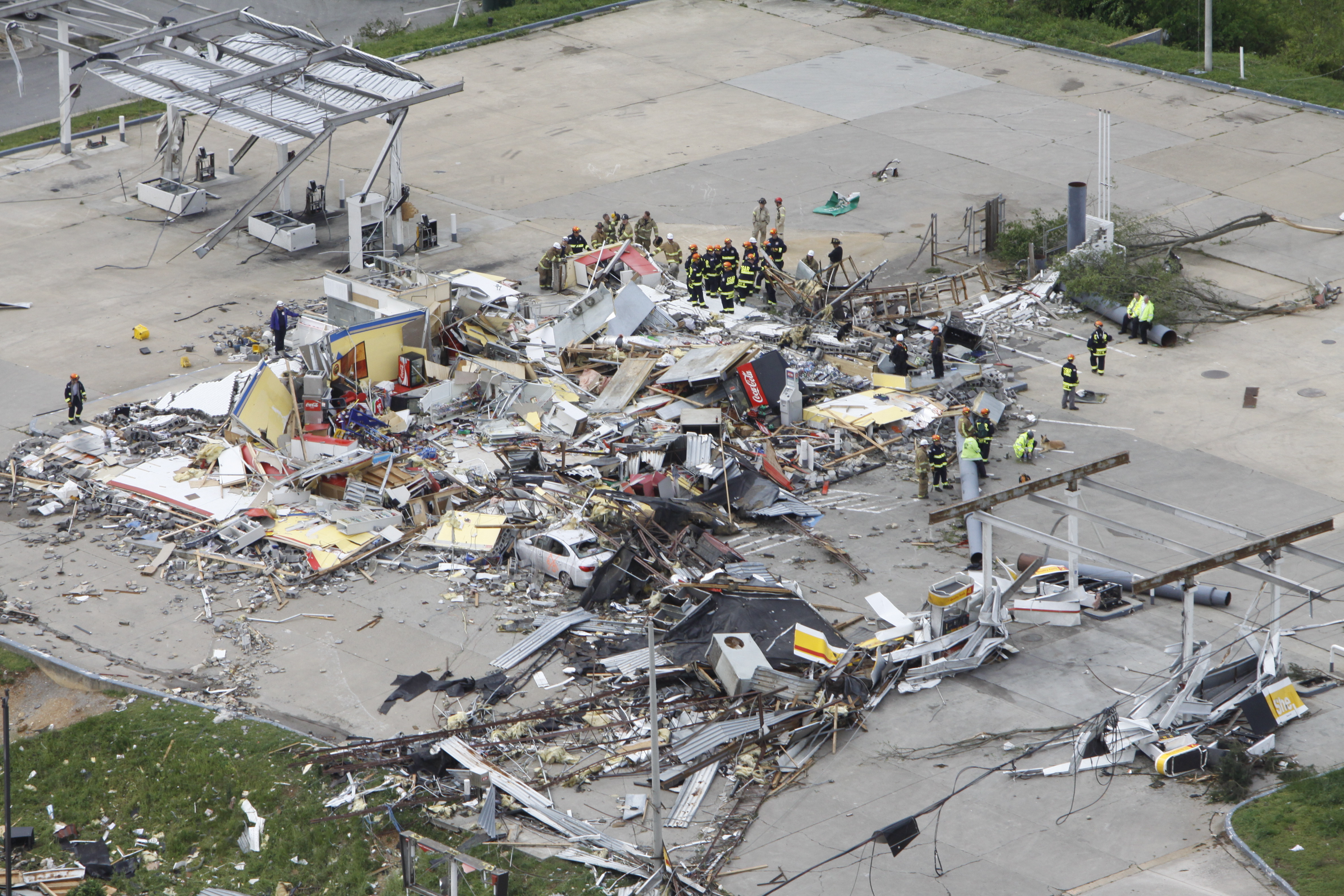 Staff photo by Dan Henry/Chattanooga Times Free Press - April 28, 2011. Emergency personnel perform search and rescue efforts at the former Shell gas station in downtown Ringgold, Ga., after overnight storms produced what is thought to be numerous tornadoes which touched down throughout the North Georgia and Chattanooga area Wednesday evening.