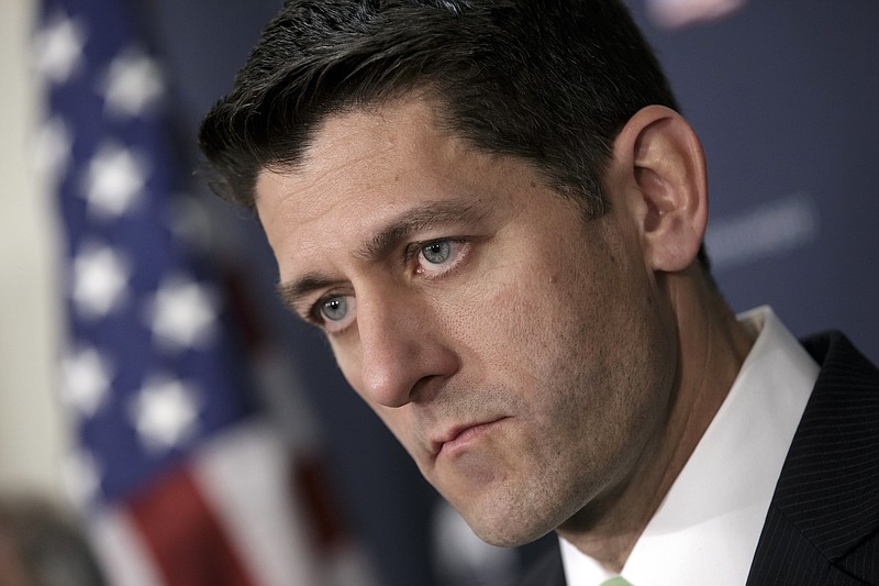 
              In this April 13, 2016, file photo House Speaker Paul Ryan of Wis., pauses during a news conference on Capitol Hill in Washington. Debt-ridden Puerto Rico faces a $422 million bond payment deadline May 1 with no sign Congress will act in time to help. Further complicating lawmakers’ efforts to steer the U.S. territory away from economic collapse are ads airing nationwide that claim the legislation amounts to a financial bailout even though the bill has no direct financial aid. House conservatives have latched onto that argument, making it difficult for Ryan, to garner support for the bill.  (AP Photo/J. Scott Applewhite, File)
            