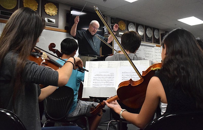 The Chattanooga Youth Orchestra, under the direction of Gary Wilkes, rehearses at Chattanooga School for the Arts and Sciences in preparation for their Spring Concert at the Tivoli Theatre on Monday. This year the orchestra celebrates its 30th anniversary.