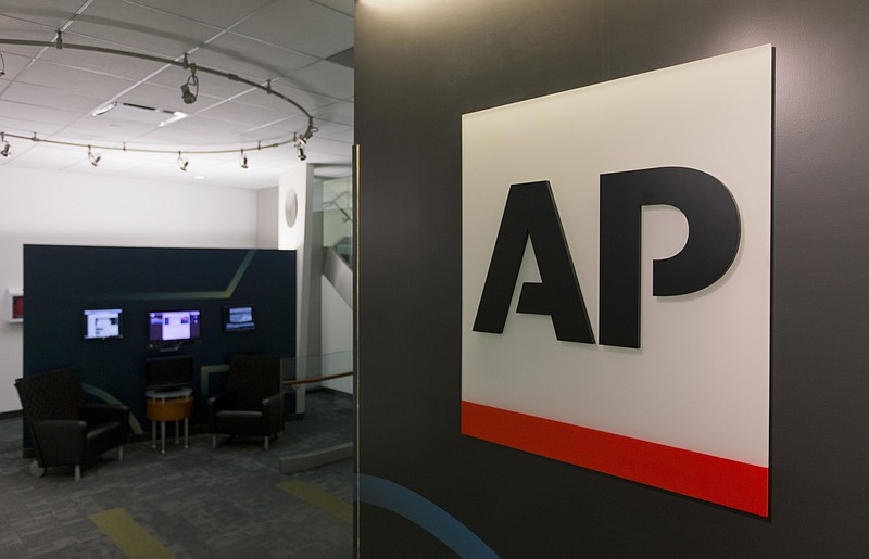 
              A logo for The Associated Press is seen at its headquarters in New York on Tuesday, April 26, 2016. AP's earnings rose 30 percent last year as the news cooperative recorded a huge tax gain and cut costs to help offset a revenue downturn reflecting the long-running financial woes plaguing newspapers and other media. (AP Photo/Hiro Komae)
            